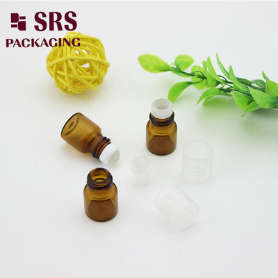 SRS kosong 1ml amber kaca gulung pada botol parfum dengan tutup plastik bening